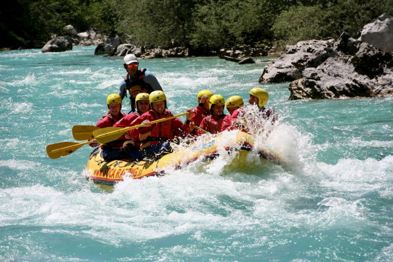 White water rafting in the beautiful Soca river in Slovenia